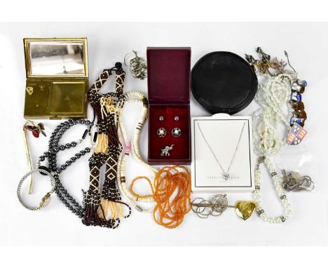 A group of costume jewellery, to include beaded necklaces and bracelet, a Dutch enamelled bracelet, pendants, pin badges, ear
