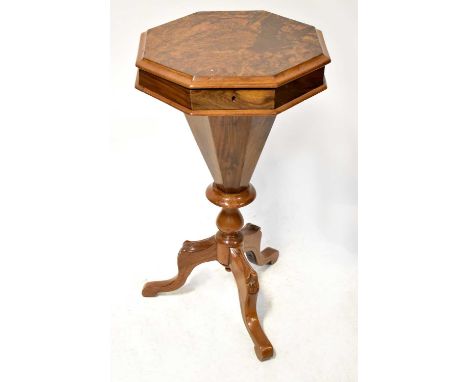 A Victorian walnut trumpet-form sewing table with octagonal top and partially fitted interior, on tripod cabriole base, 69 x 
