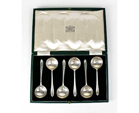 HARRODS LTD; a George VI cased set of hallmarked silver fruit spoons, in a fitted green velvet and cream lined Harrods of Lon