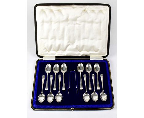 COOPER BROTHERS &amp; SONS LTD; a cased set of twelve Elizabeth II hallmarked silver teaspoons with sugar nips, Sheffield 199