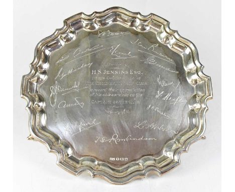 VINERS LTD; an Elizabeth II hallmarked silver salver on three scroll feet, with presentation inscription 'Presented to H. S. 