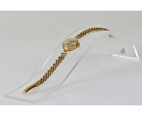ROTARY; a 9ct gold Incabloc wristwatch, seventeen jewels, the silvered dial set with baton numerals, stamped 375, on a chain 