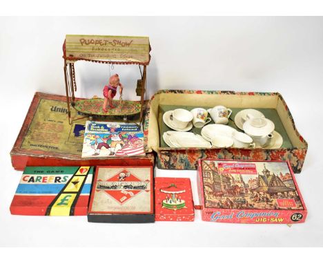 A quantity of vintage toys to include a 'Puppet-Show Pinocchio on the Swinging Stage', 'Careers' game, 'The Market Square' ji