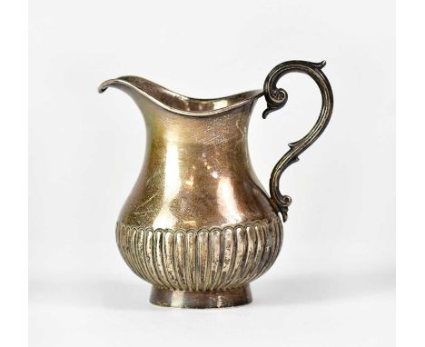 GEORGE UNITE; a Victorian hallmarked silver milk jug, height 9.5cm, Birmingham 1881, approx. 2.9ozt.