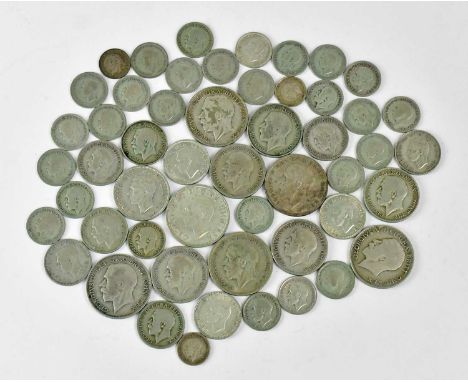 A quantity of UK half-silver coinage, to include sixpences, shillings, florins, half-crowns, etc.Condition Report: Total coin