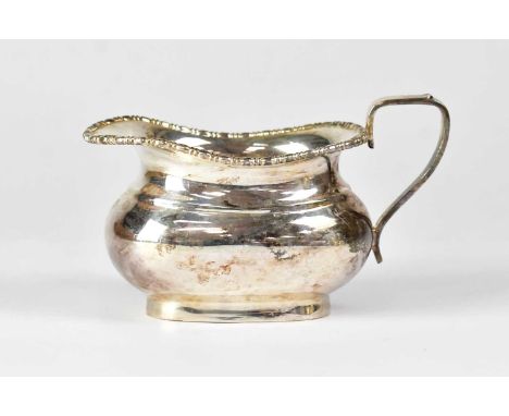 VINERS LTD; an Elizabeth II hallmarked silver milk jug with beaded rim, height 7.5cm, Sheffield 1966, approx. 6.5ozt.