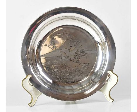 JOHN PINCHES; an Elizabeth II hallmarked silver shallow bowl, 'Peter Scott Christmas Plate 1974, etched to the centre with im