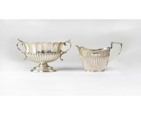 L. SPIERS; a Victorian hallmarked silver twin-handled sugar bowl, fluted with scroll handles, on a pedestal foot, Birmingham 
