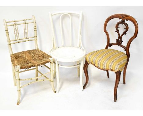 Six chairs comprising two Thonet-style bentwood chairs, a rush-seated carver chair, a painted bobbin turned bedroom chair, an