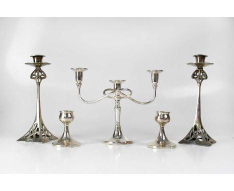 A pair of Art Nouveau white metal square section candlesticks, height 26cm, a pair of loaded hallmarked silver squat candlest