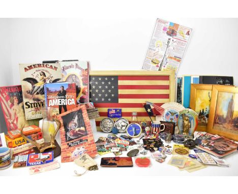 A large collection of USA related collectibles, to include reproduction tinplates, advertising signs, a hand-painted flag on 