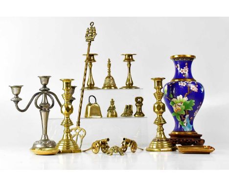 A small quantity of metalware comprising a pair of model canon on carriages, a pair of Art Nouveau style candlesticks, a pair