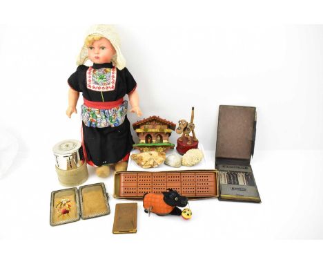 Various mixed collectibles including a Schuco German clockwork Scottie dog chasing a tinplate ball, a cribbage board, a Yorks