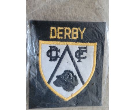 VINTAGE DERBY COUNTY SEW ON BADGE
Still in original packet