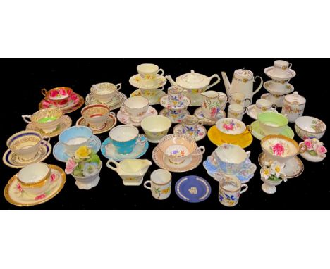 An Aynsley part coffee service, decorated with pagodas and birds; another, Paragon; a Tuscan China tea for two; various tea c