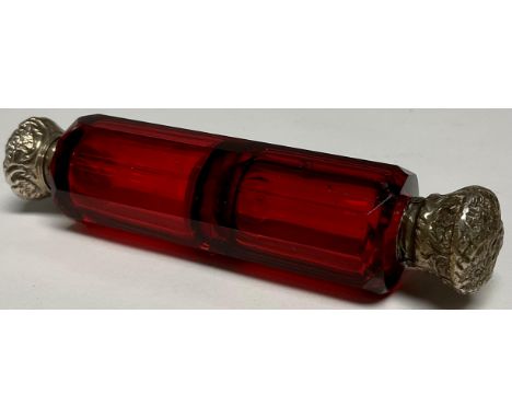 A Victorian ruby glass double ended scent, silver coloured metal tops 