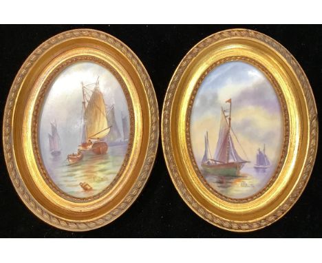 Ernest Roy Booth for Royal Worcester, a pair of oval porcelain plaques, painted with ships at full mast, signed, 11cm x 7.5cm