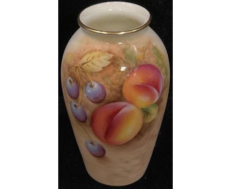 A Royal Worcester slender ovoid vase, painted with peaches and berries on a mossy ground, decorated by Frank Roberts, signed,