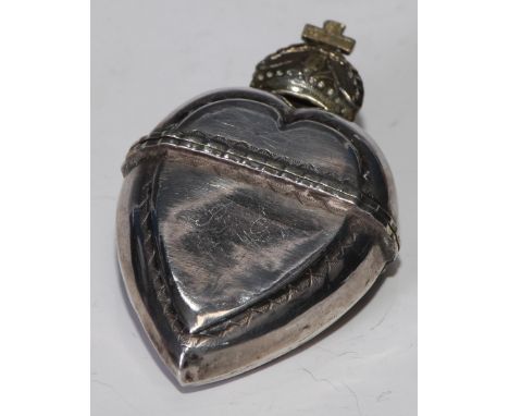 A Norwegian silver and silver-gilt heart shaped marriage box, hinged cover with crown finial, 7cm long, 19th century 