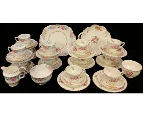 A Crown Staffordshire tea service for six, floral pattern, comprising cake plate, side plates, cream jug, sugar bowl, cups an