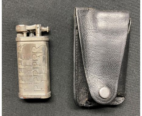 Pipe Lighter with engraved depictions of all different types of Pipes. Removeable tamping tool. Complete with pouch. Maker ma