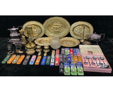 An Eccles Type 6 miner's safety lamp; another, smaller; a WWII trench art table lighter; pressed brass plaques; a plated four