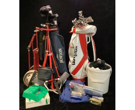 Golf - a Wilson leather caddy bag; a Titleist golf trolley; a Blackwell golf trolley; a golfer's Pro Quip waterproof jacket, 