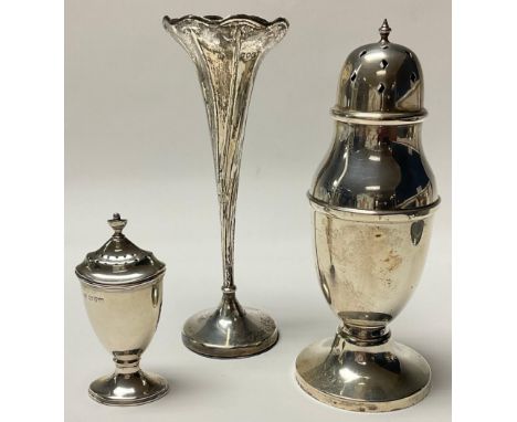 A George V silver baluster sugar caster, pierced domed cover with spire finial, 16.5cm, Birmingham 1933, 108g; an Edwardian s