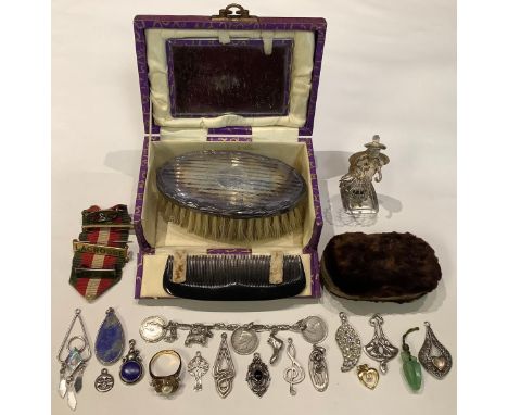 Silver, Jewellery and Bijouterie - a silver and lapis lazuli pendant; charms; various silver pendants; a Chinese menu holder;