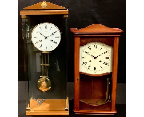 A Hermle wall clock, 59cm; a Rapport wall clock (2) 