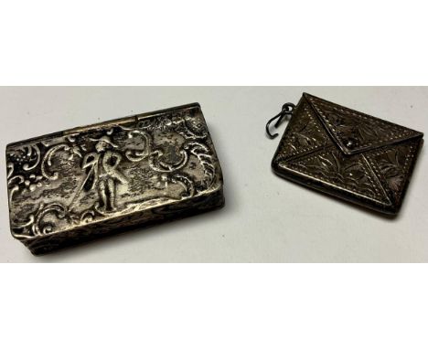 A 19th century silver snuff box as a book, hinged cover, embossed with fashionable figures and c-scrolls, probably continenta