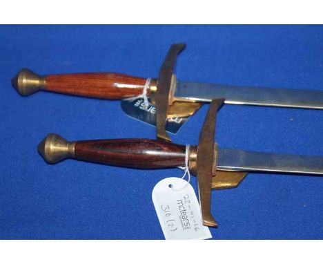 TWO WILKINSON SWORD COMMEMORATIVE SWORDS 
sword cutlers to Her Majesty, each with gilt brass and hardwood handles, etched bla