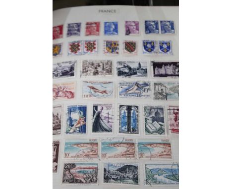 TWO FG SUSSEX STAMP ALBUMS
containing World, GB and Commonwealth stamps