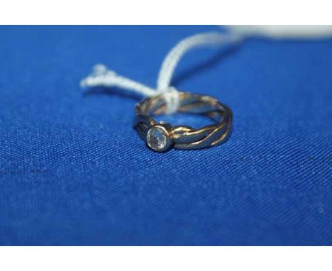 DIAMOND SOLITAIRE RING
the brilliant cut diamond approximately 0.26 carats, on an unmarked twist design shank, size I-J