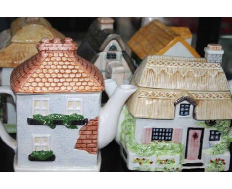 SELECTION OF DECORATIVE COTTAGE TEA POTS
along with cottage ceramic ornaments