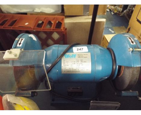 A Wolf Twin Wheel Bench Grinder.