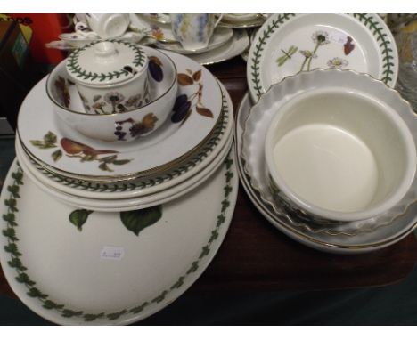 A Tray Containing Royal Worcester Evesham and Portmeirion Botanic Garden Dinner Wares.