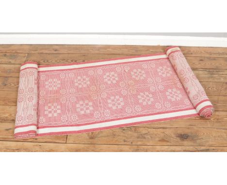A vintage traditional Swedish runner rug, with geometric and floral motif, size L480 x W66cm.