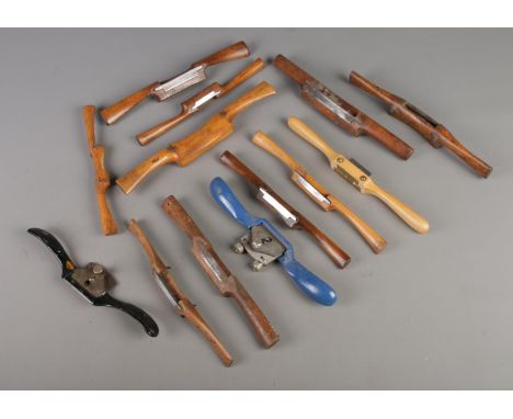 A quantity of antique and vintage spoke shaves tools including mahogany and brass mounted examples, some being produced by Ma