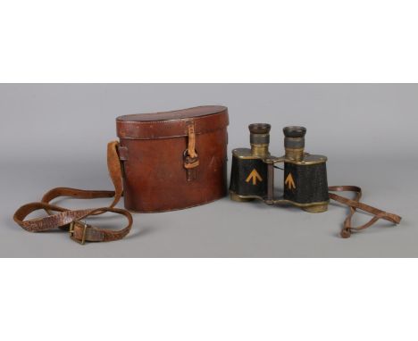 A pair of Ross, London Stereo Prism Binoculars (Power = 6), bearing military broad arrow marks to the frame in fitted case, a