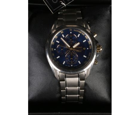 A boxed Seiko Chronograph Titanium wristwatch.  Running but does not re set at 12 o'clock.