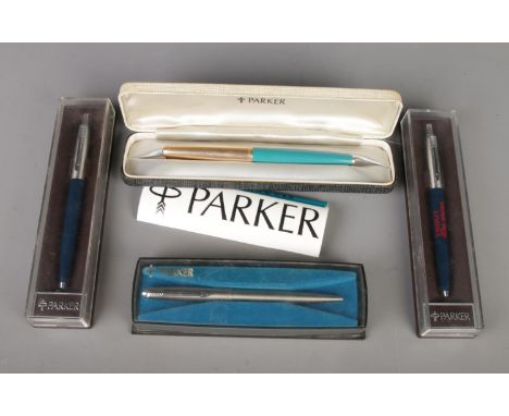 Four cased Parker pens. Includes Parker 61 with gold plated lid and three ballpoint examples.