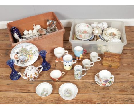 Two boxes of miscellaneous to include blue glass candlesticks, Real Old Willow plate, Peter Rabbit ceramics, Winnie The Pooh,