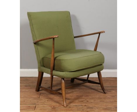 A vintage Ercol armchair, Model 248, upholstered in light green fabric to the cushioned back rest and seat pad.