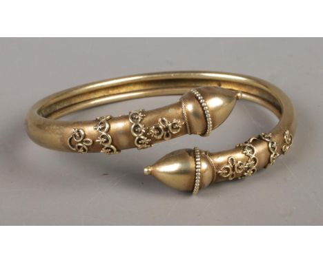 A Victorian yellow metal bangle