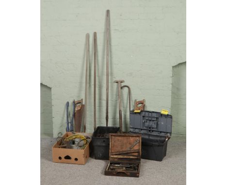 A good collection of mostly vintage tools to include spade, saws, chisels, sledge hammer head, wiring, etc.