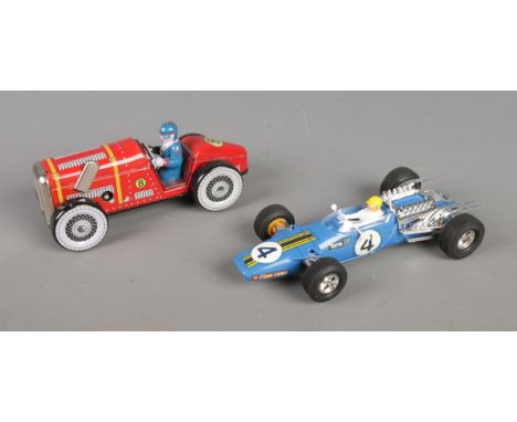 Two boxed vintage model cars, including Tri-ang Scalextric 1969-72 "Race Tuned C14 Matra GP" and a MS447 metal Tin wind up ca