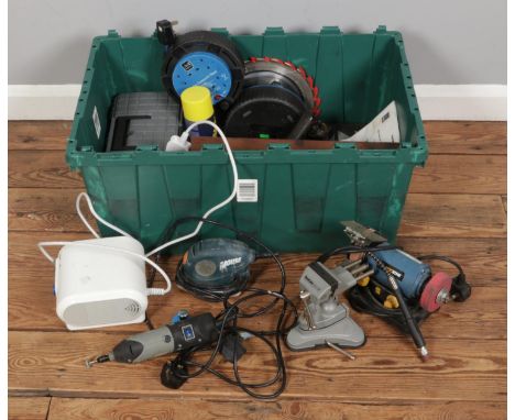 A mixed box of tools and accessories including small bench grinder, palm sander, tabletop vice, blades, screws, drill bits et
