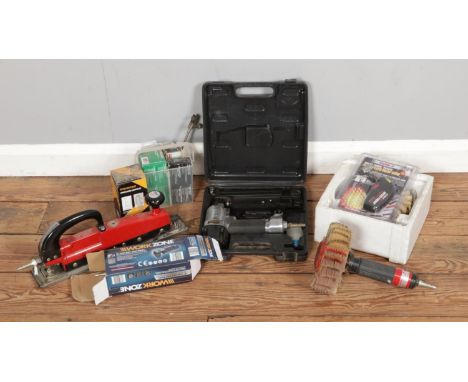 A quantity of air tools and accessories including a cut off tool, air sander, rotary tool, ToolTech nail gun with pins and na