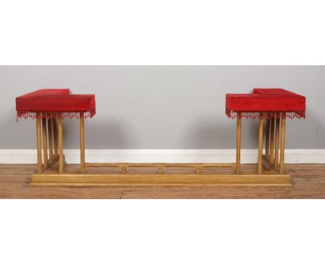 An oak framed club fender, with column supports and fabric upholstery to both front corners. Height: 51cm, Width: 155cm, Dept